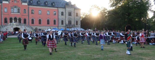 Massed band in front of castle